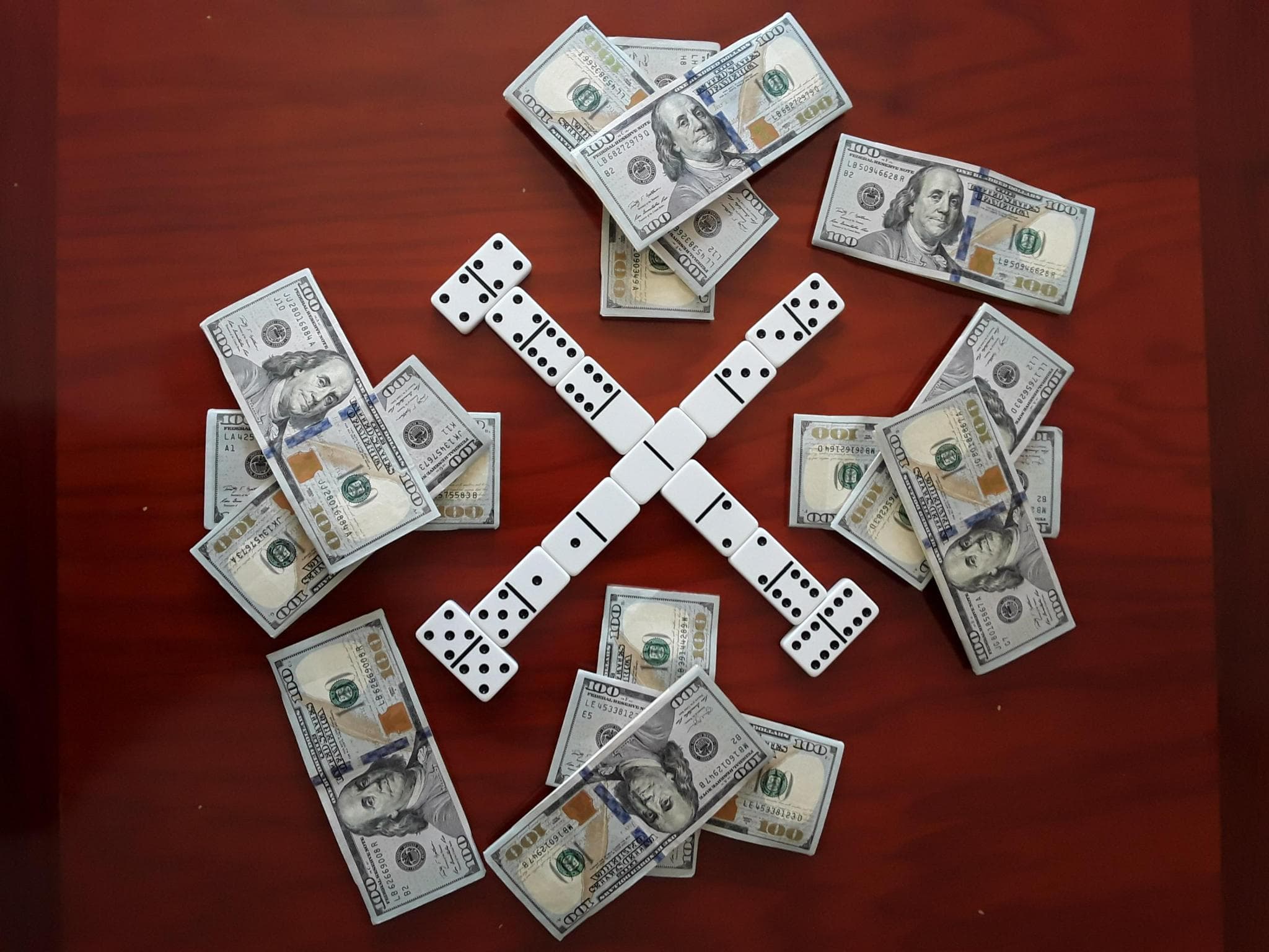 Dominoes arranged in X pattern